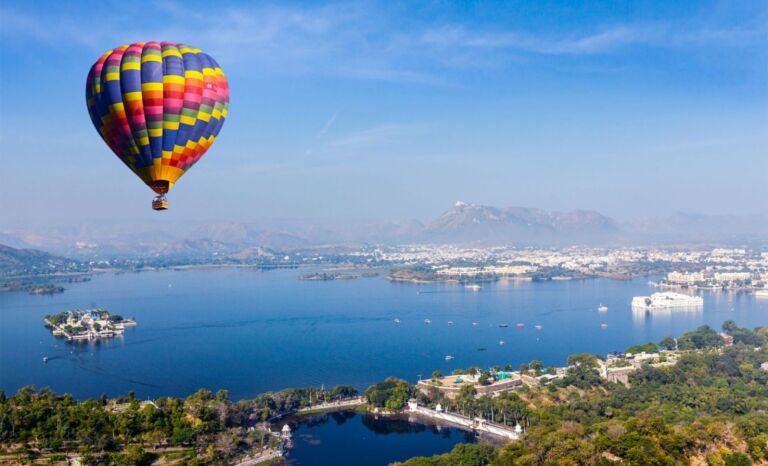 aerial view of lake pichola with lake palace jag 2021 08 26 22 58 05 utc pmmi2d677j24zea7lk5p7lkjes4o2pcxuv3h2nmig0 768x466